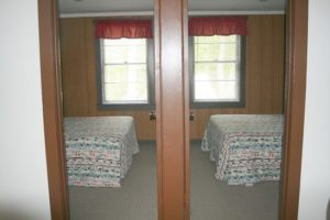 Gray Lakeshore Cottage bedrooms