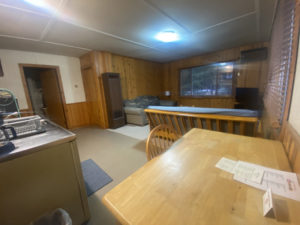 Cottage dining table, kichen and living room