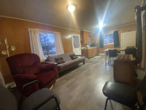 Cottage living room, kitchen and dining table.