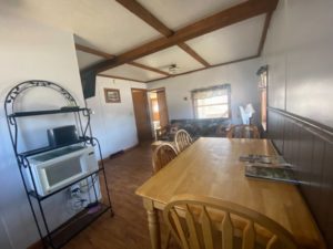 Cottage 6 dining table, kitchenette, living room