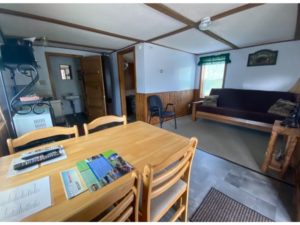 Lakeview Cottage 4 - living room, dining table and kitchen.